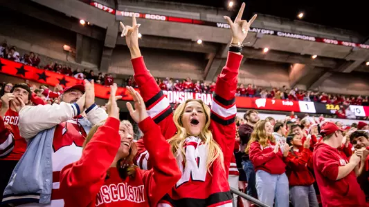 Fans cheer on the Badger men's hockey team