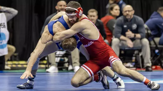 Wisconsin wrestler Eric Barnett pins Tanner Jordan (South Dakota State) in 45 seconds during the opening round of the 2024 NCAA Championships held at the T-Mobile Center in Kansas City, Missouri on Thursday, March 21, 2024.