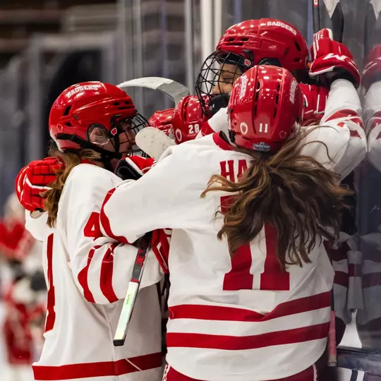 Wisconsin women's hockey celebrates a goal against Colgate on March 22, 2024