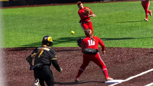 Ellie Hubbard throws out runner