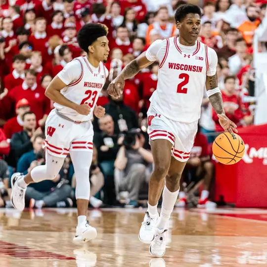 AJ Storr (2) and Chucky Hepburn (23) against Illinois