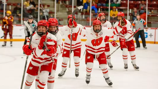 Wisconsin women's hockey celebrates a goal from Casey O'Brien against Minnesota in the WCHA Final Faceoff semifinal game
