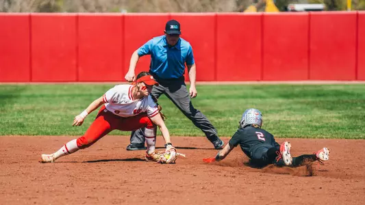 Ava Kuszak tags out a runner at second