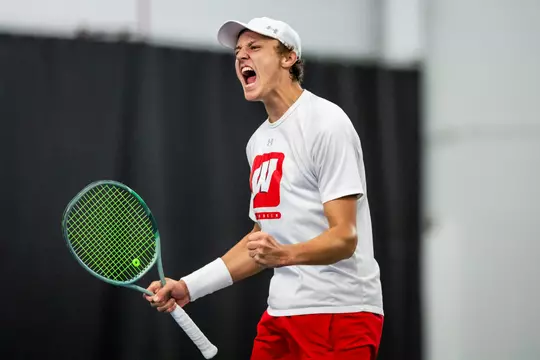 The Wisconsin Badgers men’s tennis team plays against Northwestern in Nielsen Tennis Stadium in Madison, Wisconsin on April 5, 2024. (Photo by Taylor Wolfram / Wisconsin Athletics Communications)
