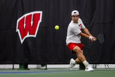 The Wisconsin Badgers men’s tennis team plays against Northwestern in Nielsen Tennis Stadium in Madison, Wisconsin on April 5, 2024. (Photo by Taylor Wolfram / Wisconsin Athletics Communications)