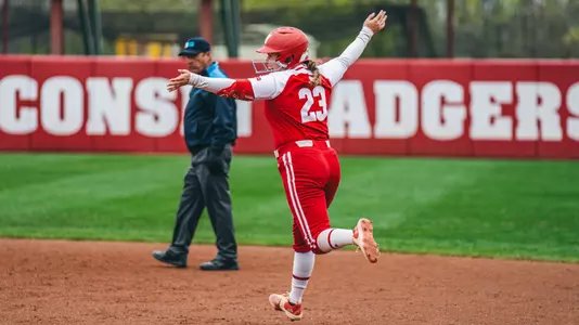 Hilary Blomberg circles bases after home run against Penn State