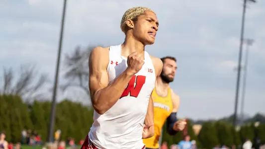 Giovanni Wearing sets a personal best in the 200 meters at the Texas Invitational in 21.40 seconds on April 26th