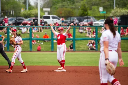 Hilary Blomberg celebrates for her first career stolen base against Indiana