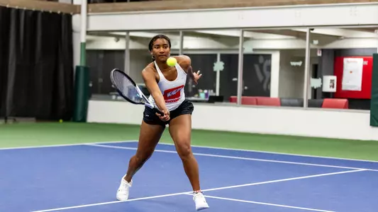 Ariel Johnson reaches for the shot