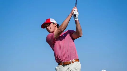 Cameron Huss takes a swing at the Invitational at the Ford