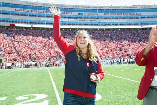 Wisconsin Badgers Kelsey Card waves to the crowd after receiving the Big Ten Medal of Honor from Athletic Director Barry Alvarez during an NCAA college football game against the Georgia State Panthers Saturday, September 17, 2016, in Madison, Wis. The Badgers won 23-17. (Photo by David Stluka)