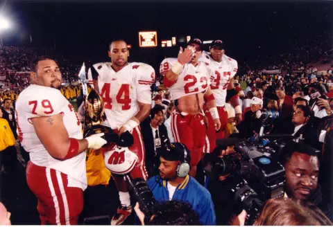 Thompson with Rose Bowl trophy