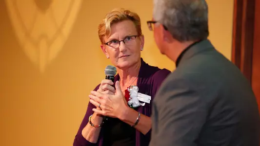 Kris Thorsness talks at UW Athletic Hall of Fame induction