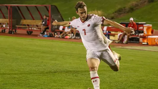 Kevin Andrews shoots against Green Bay