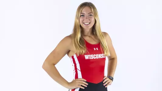 Olivia Meskan with her hands on her hips