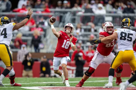 Wisconsin Badgers quarterback Braedyn Locke (18) throws the ball during a Big Ten Conference NCAA college football game against the Iowa Hawkeyes, Saturday, Oct. 14, 2023, in Madison, Wis. The Hawkeyes won 15-6. (Photo by David Stluka/Wisconsin Athletic Communications)