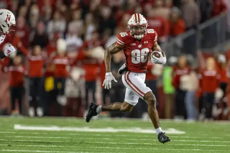 Wisconsin Badgers punt returner Vinny Anthony II (86) returns a punt during a Big Ten Conference NCAA college football game against the Nebraska Cornhuskers, Saturday, Nov. 18, 2023, in Madison, Wis. The Badgers won 24-17 in overtime. (Photo by David Stluka/Wisconsin Athletic Communications)