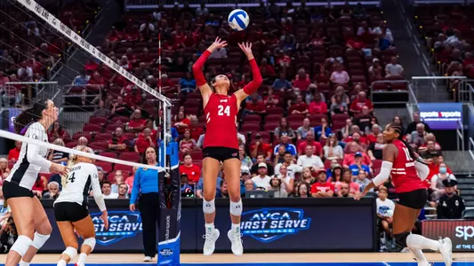 Charlie sets the ball in match vs Louisville