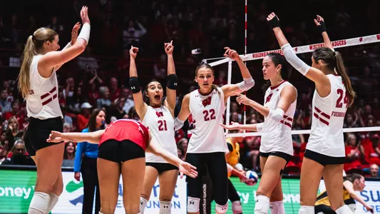 Team celebrates on the court