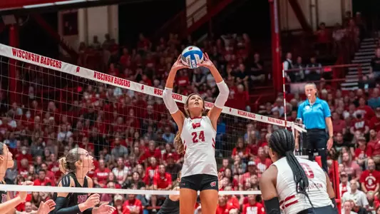 Charlie Fuerbringer sets the ball