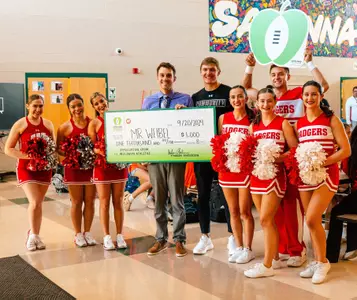 Haakon Anderson surprises sixth grade teacher with a gift