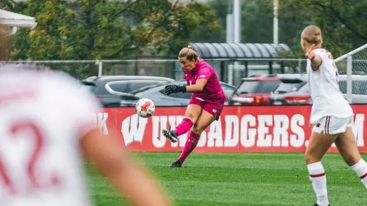 Stover kicks away ball