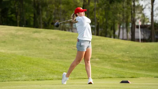 Carly Carter tees off during the 2024 Badger Invitational