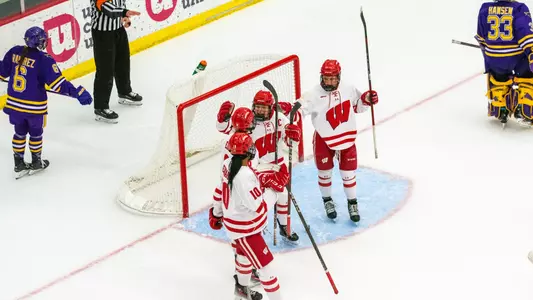 Casey O'Brien and the Badgers celebrate a goal against the Minnesota State Maverick on Jan 12, 2025.
