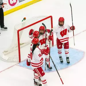 Casey O'Brien and the Badgers celebrate a goal against the Minnesota State Maverick on Jan 12, 2025.