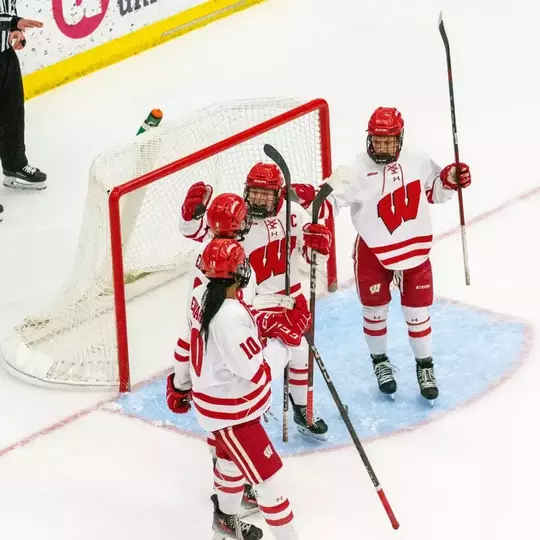 Casey O'Brien and the Badgers celebrate a goal against the Minnesota State Maverick on Jan 12, 2025.