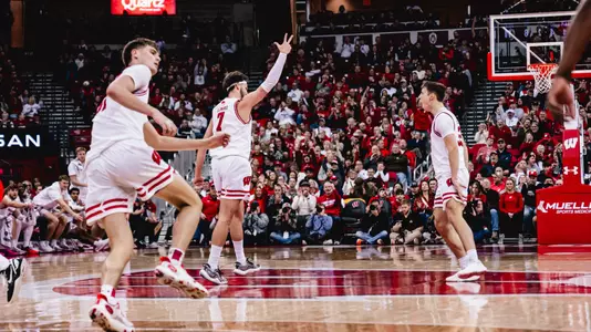 Carter Gilmore celebrates a three against Ohio State