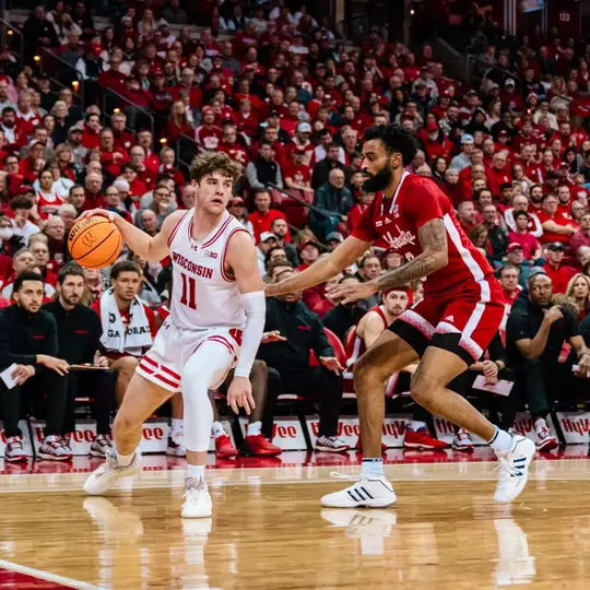 Max Klesmit goes up against Nebraska's Brice Williams