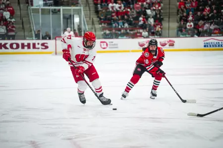 Kelly Gorbatenko stick handles the puck in the game vs St. Cloud State