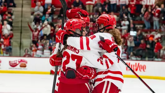 Kirsten Simms, Caroline Harvey celebrate a goal during a game on Jan. 26, 2025, against St. Cloud State
