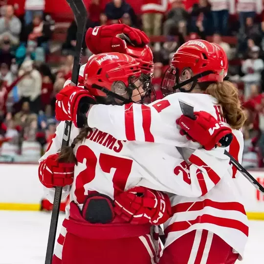 Kirsten Simms, Caroline Harvey celebrate a goal during a game on Jan. 26, 2025, against St. Cloud State
