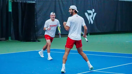 Patrik Meszaros and Michael Minasyan celebrate a point