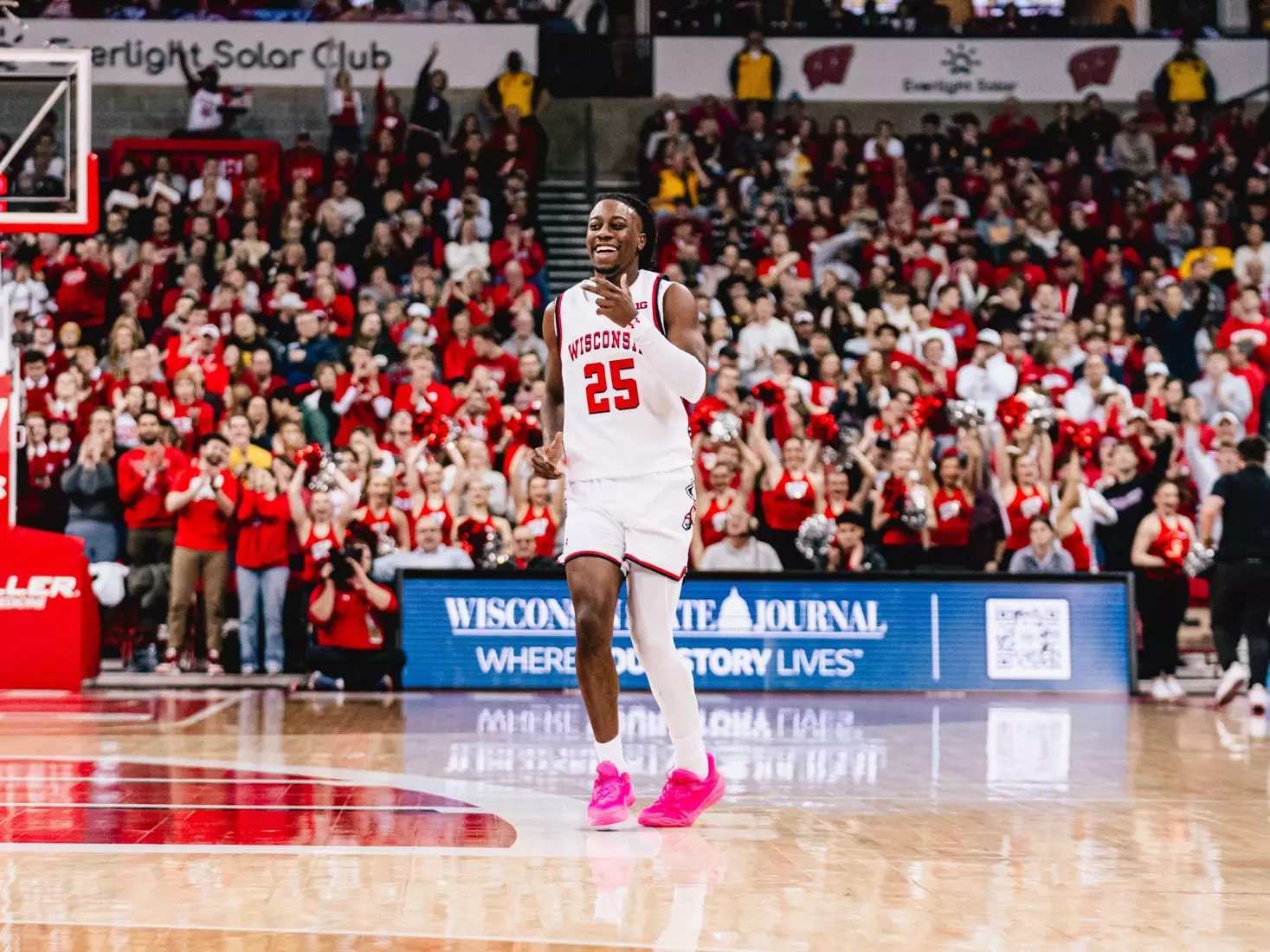 John Blackwell celebrates a three-pointer vs. Iowa