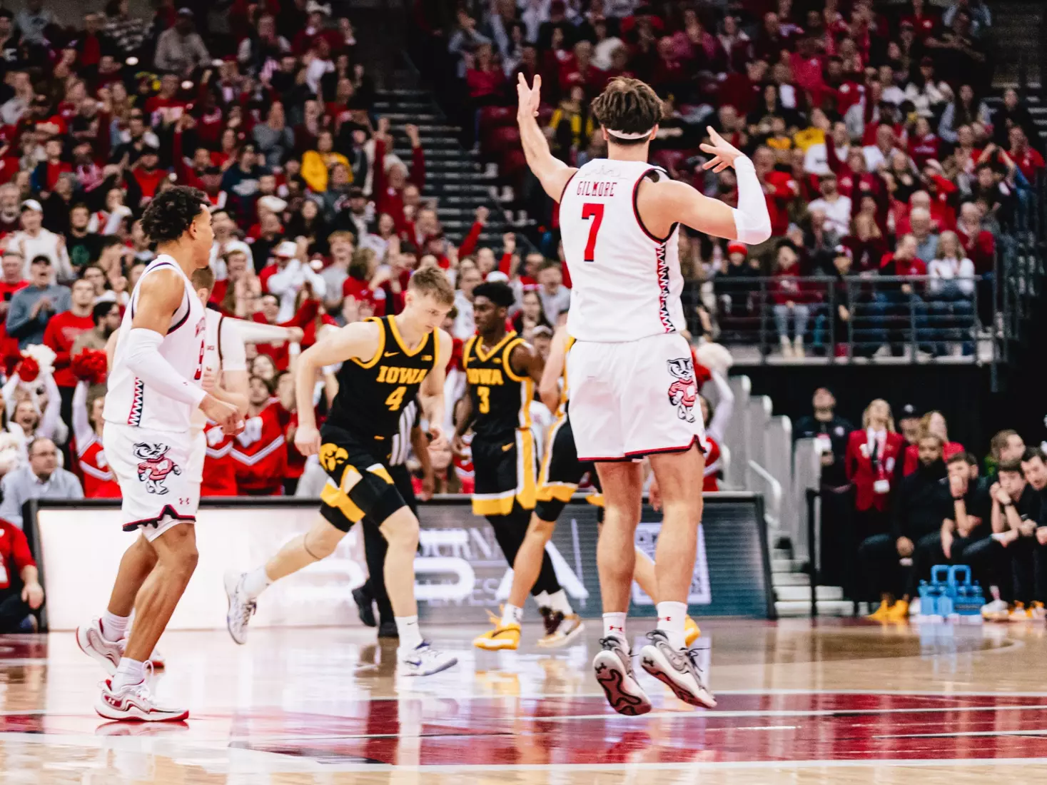 carter Gilmore celebrates a three pointer vs. Iowa