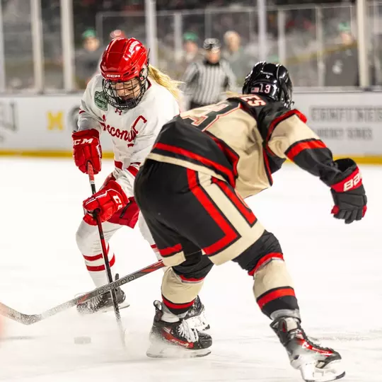 Casey O'Brien stick-handles against OSU