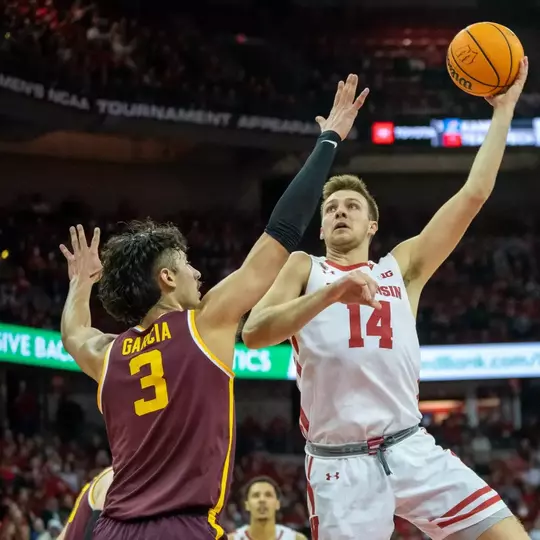 Carter Gilmore takes the shot against Minnesota in 2023