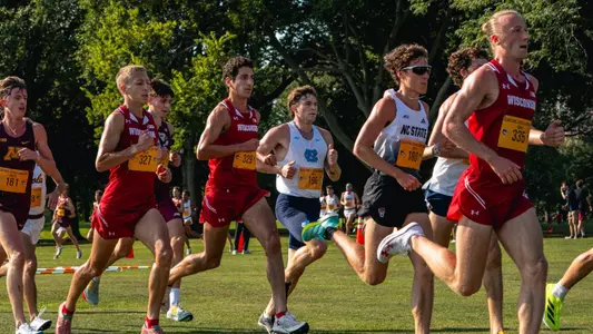 Men running at Sean Earl Lakefront Invitational