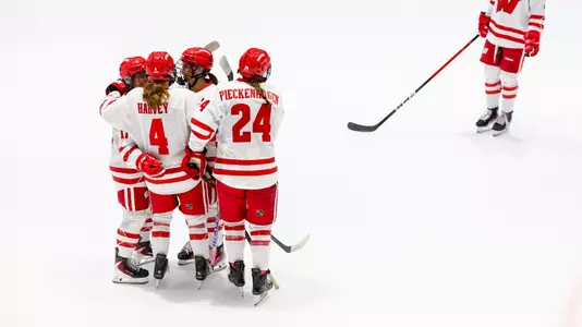 Badgers celebrate a goal against Vermont at the Ice Breaker Tournament