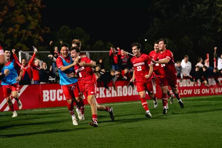Zachemski celebrates a goal with his teammates