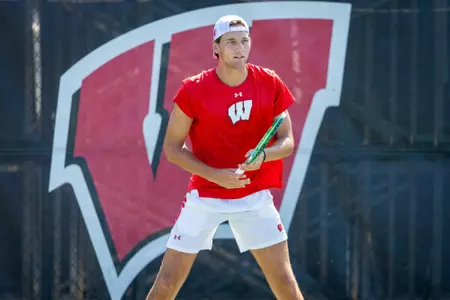 Beduhn prepares to return a serve