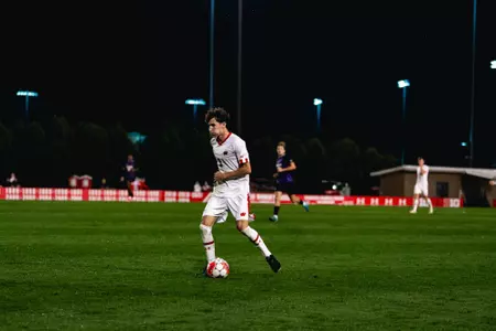 Isaac Brown Samper dribbles the soccer ball