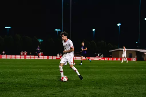 Isaac Brown Samper dribbles the soccer ball