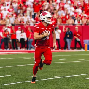 Sean West carries the ball vs. Ohio State