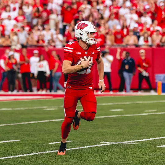 Sean West carries the ball vs. Ohio State