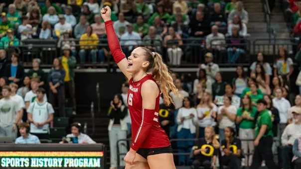 Mimi Colyer celebrates after winning a point against Oregon.