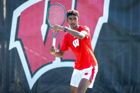 Sachiv Kumar prepares to return a serve
